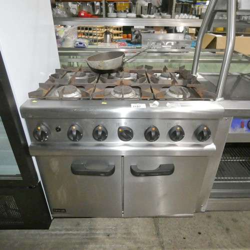 1187 - A commercial stainless steel gas fired 6 ring range with 2 door oven beneath - trade