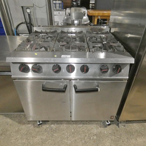 1218 - A commercial stainless steel gas fired 6 ring range with 2 door oven beneath by Falcon, Dominator - ... 