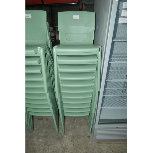 1225 - 11 green plastic stacking chairs