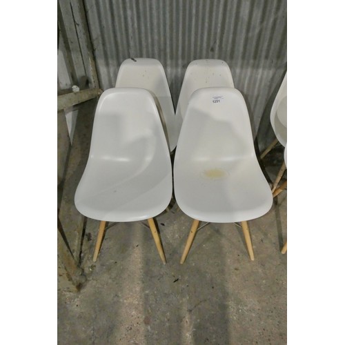 1251 - 4 x white plastic designer style chairs with metal / wood frames