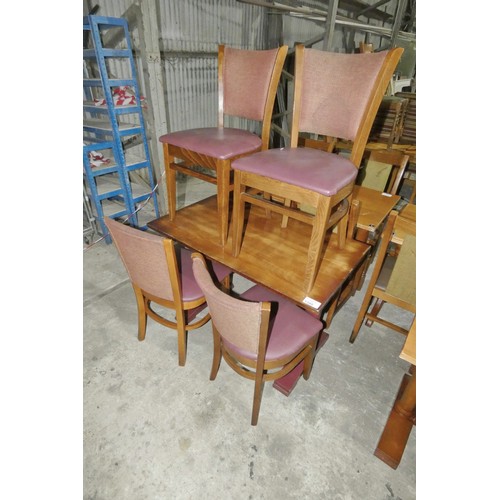 1300 - A wooden restaurant/pub type table with 4 matching red upholstered dining chairs