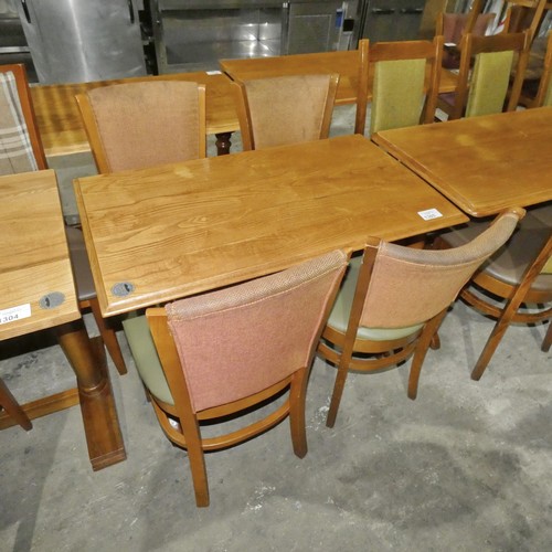 1305 - A wooden restaurant/pub type table with 4 matching green upholstered dining chairs