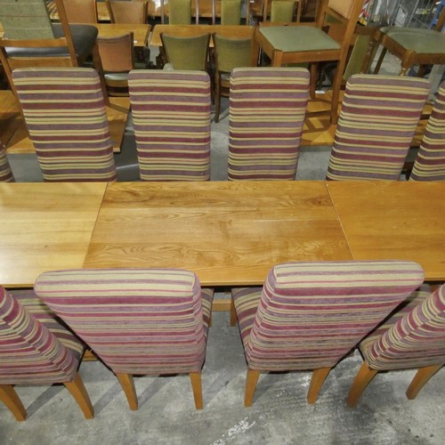 1322 - A rectangular wooden restaurant/pub type table with 4 matching purple striped upholstered dining cha... 