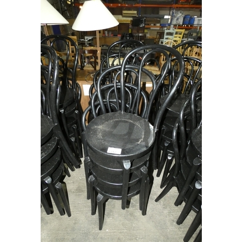 1342 - 8 x matching Evolutif black plastic stacking chairs