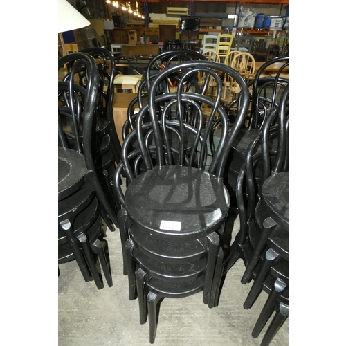 1343 - 8 x matching Evolutif black plastic stacking chairs