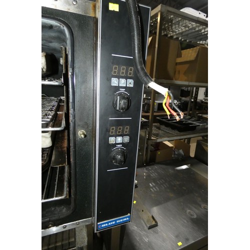 1023 - A commercial stainless steel mobile fan oven by Blue Seal type Turbofan, type E32D4 240v - trade