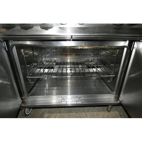 1212 - A commercial stainless steel gas fired 6 burner range with 2 door oven beneath by Lincat - trade