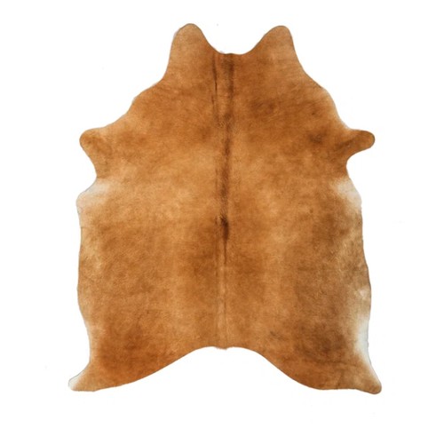 536 - 1 x Bryan cowhide beige rug approx 150 x 170cm (irregular shape as genuine cowhide) RRP £214. Please... 