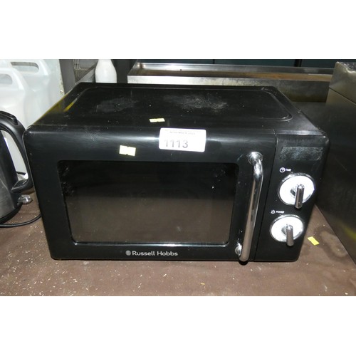 1113 - A black microwave oven by Russell Hobbs - trade, Tested Working