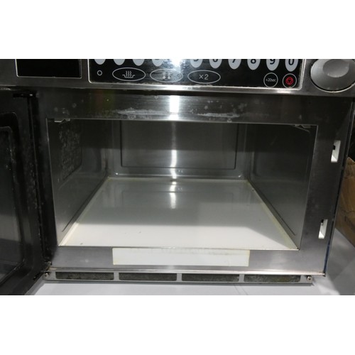 1214 - A commercial stainless steel microwave oven by Samsung type CM1529, 1500w. Please note this unit req... 