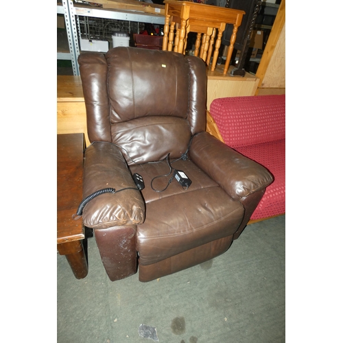 2147 - 1 x brown upholstered electric reclining armchair with a wired remote control and a mains power supp... 