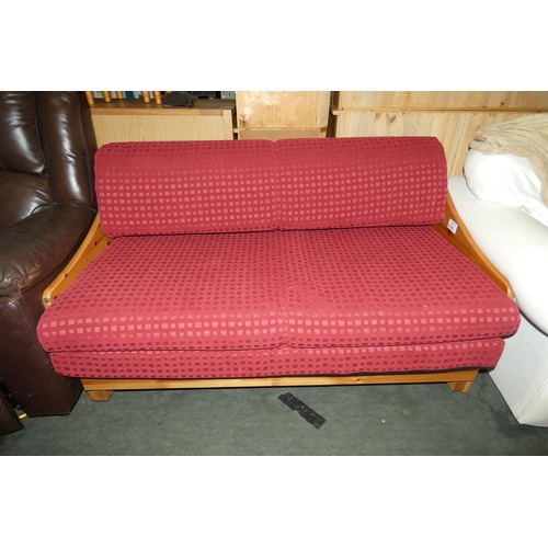 2148 - A Stompa Pine framed futon type sofa bed approx 141cm wide