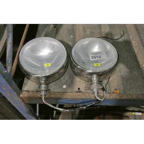 2012 - A pair of chrome vehicle spotlights