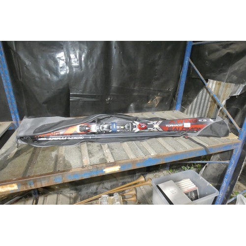 2016 - A pair of Salomon XWing Tornado skis and a pair of Elan Mag ski poles