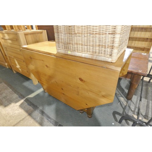 2143 - A Pine gate leg drop leaf table approx 128 x 53cm and approx 128 x 183cm with both leafs up