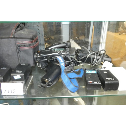 2445 - A Sony Handycam video 8 camcorder CCD-TR305E with batteries and charger, an Olympus AZ-300 super zoo... 