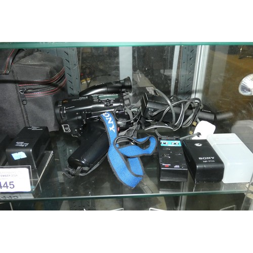 2445 - A Sony Handycam video 8 camcorder CCD-TR305E with batteries and charger, an Olympus AZ-300 super zoo... 