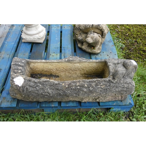 2697 - A decorative concrete planter with a squirrel