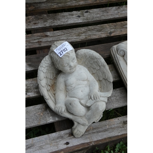 2702 - A concrete sleeping cherub bird bath