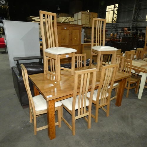 2745 - A set of 8 wooden framed high back cream upholstered dining chairs