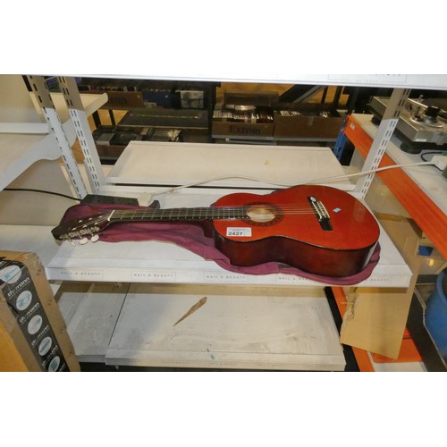 2427 - An acoustic guitar by Valencia with canvas carry case