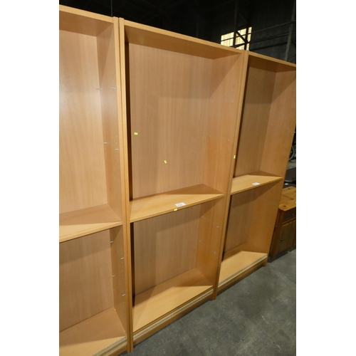 2782 - A tall wood effect bookcase with 5 shelves approx 80x28x203