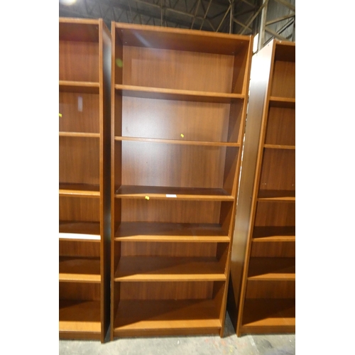 2789 - A tall dark wood bookcase with 5 shelves approx 80x29x203cm