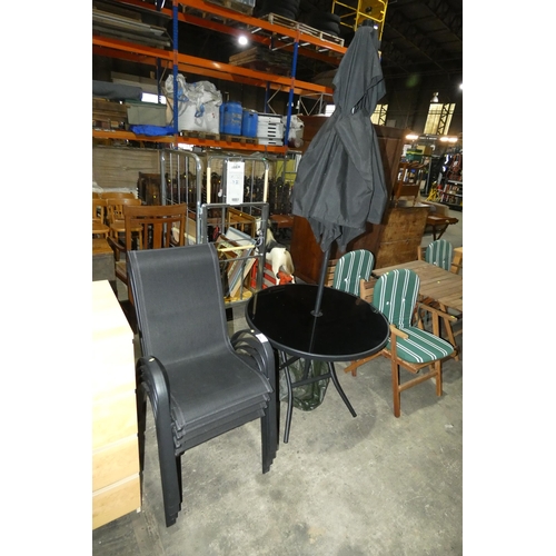 2796 - A set of garden furniture comprising of a round 89cm glass topped table, a black parasol & 4 matchin... 