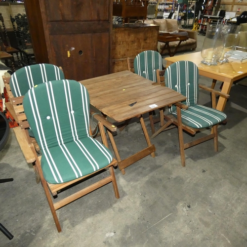 2797 - A folding wooden garden furniture set comprising of a square table approx 80cm and 4 chairs with gre... 