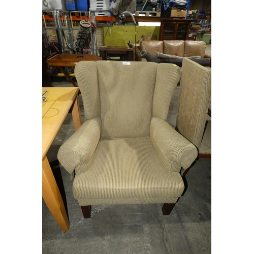 2800 - A green striped upholstered arm chair