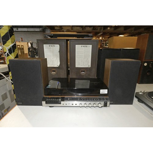 2437 - A stereo system by Hitachi type SDT-7710 with speakers - trade