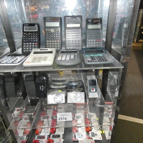 2516 - A quantity of various scientific and other calculators, cameras and Dictaphones - trade