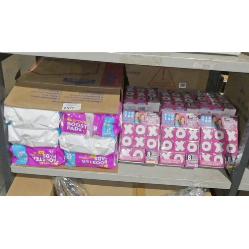 2577 - A quantity of nappy booster pads and tic tac toe games