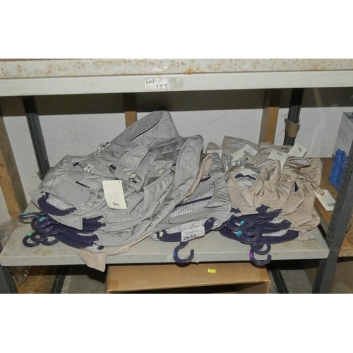 2632 - A quantity of various size dog jackets by Sydney and Co. Contents of 1 shelf