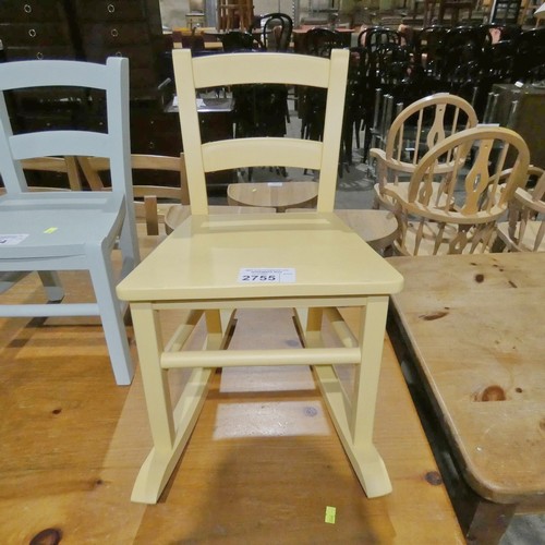 2755 - A child's yellow wooden rocking chair