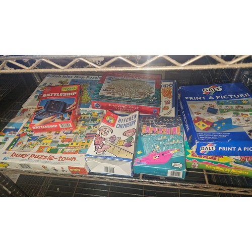 2313 - A quantity of various games. Contents of 2 shelves