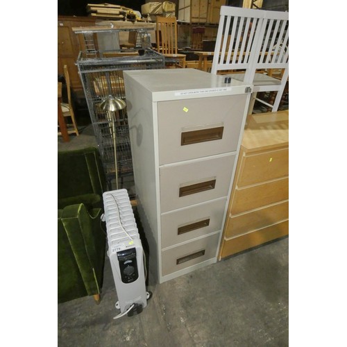 2779 - A heater, standard lamp and a four drawer filling cabinet