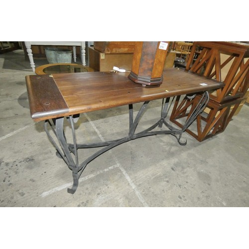 2792 - A decorative metal framed dark wood hall table approx 156x56cm