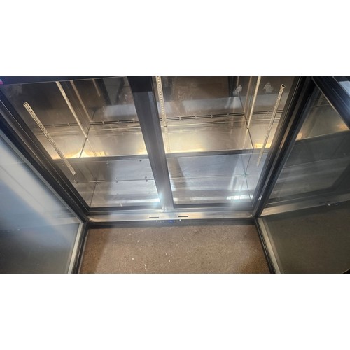 1173 - A commercial stainless steel counter height frosted glass door fridge by IMC type V90, unit requires... 