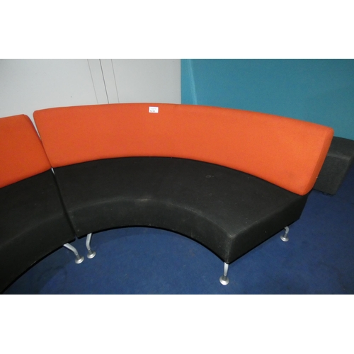 1430 - A two tone upholstered curved reception type seat by Orangebox approx 175cm wide - black / burnt ora... 