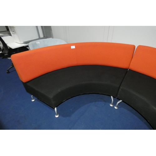 1431 - A two tone upholstered curved reception type seat by Orangebox approx 175cm wide - black / burnt ora... 