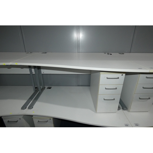 1437 - 1 x white piano / wave front office table approx 140 x 100cm supplied with a white under work top pe... 