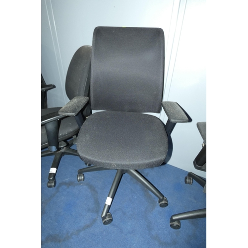 1446 - 1 x Haiken black upholstered office swivel chair with mesh back panel