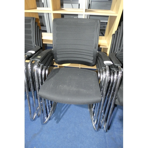 1497 - 4 x Interstuhl black upholstered stacking cantilever chairs. Please note there is wear where the cha... 