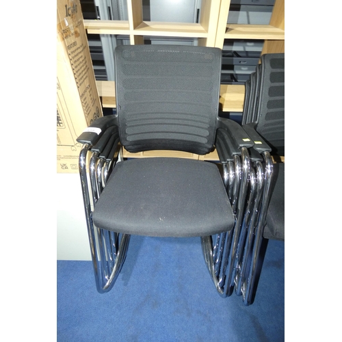 1499 - 4 x Interstuhl black upholstered stacking cantilever chairs. Please note there is wear where the cha... 