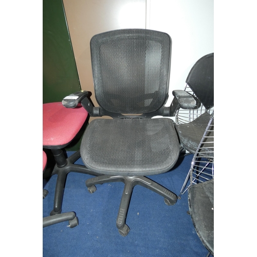 1519 - 1 x black upholstered office swivel chair with mesh back panel