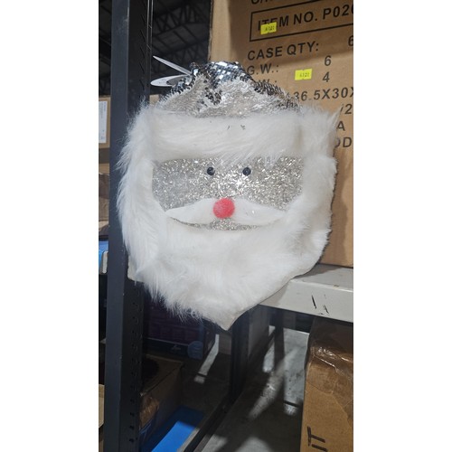 2593 - A box containing 6 battery operated Santa head decorations