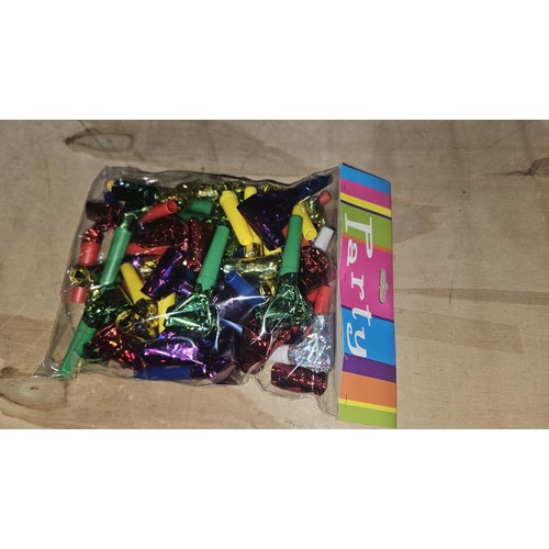 2602 - A box containing 4 smaller boxes with 6 packets of 25 party blowers (approx 600)