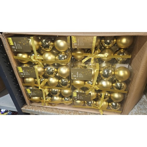 2604 - A box containing 48 packets of 8 gold baubles (approx 380)