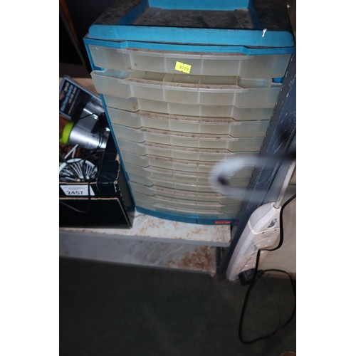 2457 - A quantity of various items including a multi section set of drawers, usb light, audio cables etc. C... 